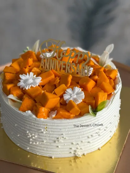 A delicious combination of flavours in this custom chocolate mango cake for an anniversary.