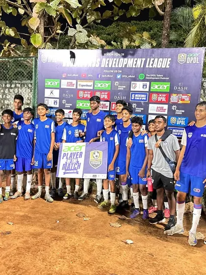 The U15 team and coaches celebrate a player's individual award, highlighting our focus on both team success and personal achievement.