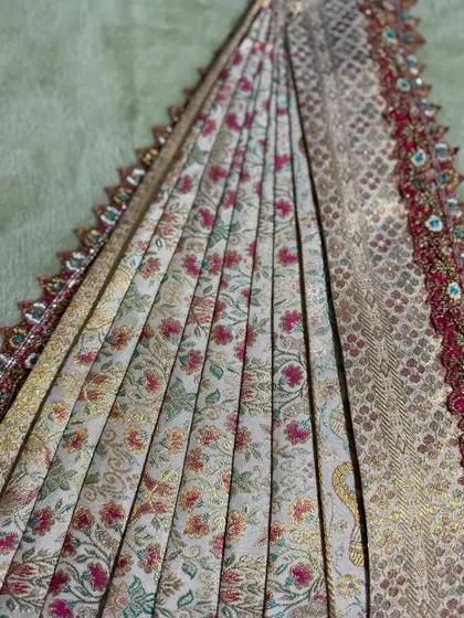 The beauty of perfectly ironed and set pleats. This is the foundation of a flawless saree drape.