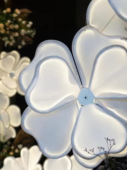 A macro shot of the custom-made illuminated flowers. This highlights the craftsmanship and attention to detail that goes into creating unique decorative elements for my events.