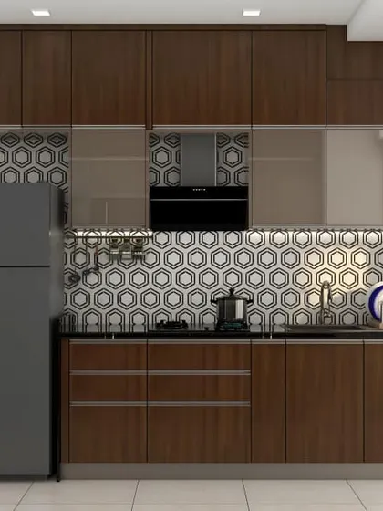 This straight-wall kitchen uses rich, dark wood cabinets for both upper and lower storage, creating a warm and cohesive look. The geometric honeycomb backsplash and under-cabinet lighting add a modern flair to the traditional wood finish.
