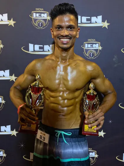 The victory shot. Holding two trophies after a successful run at the ICN championship, a result of my natural contest prep protocol.