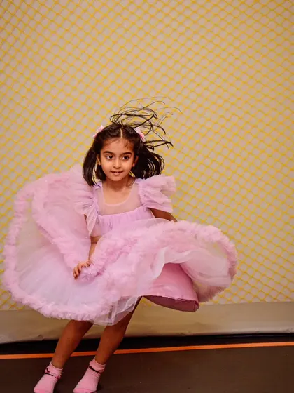 A princess twirling and jumping on the trampoline. The play zone is designed for active fun and letting out all that energy.