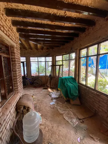 The enclosed verandah of the century-old villa during the restoration process. We aim to open up these spaces to light and the surrounding garden, breathing new life into every corner.