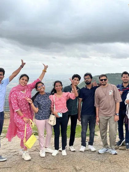 A happy group photo from our Nandi Hills trip. It's a great option for first-time trekkers and those looking for a relaxed day out.