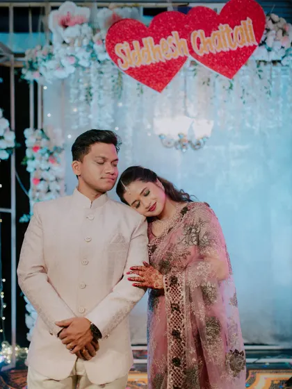 A quiet, romantic moment shared by the couple during their engagement ceremony.