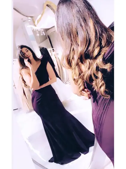 A throwback mirror selfie. A well-fitted black gown is a must-have in any wardrobe for its timeless elegance and versatility.