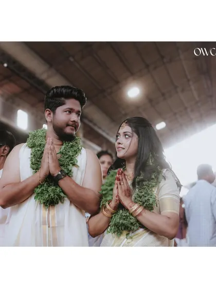 A couple offers a prayer together during their temple wedding, a moment of shared faith and new beginnings.