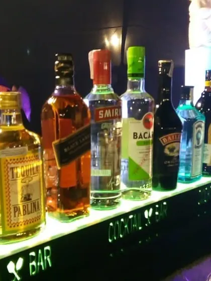 A well-stocked bar with a wide selection of premium spirits, ready for our bartenders to craft delicious cocktails for the guests.