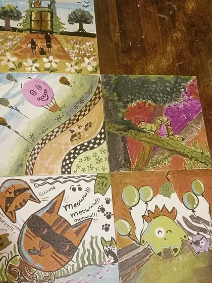 A collection of the unique, collaborative artworks created during our "Canvas Carousel" painting event.