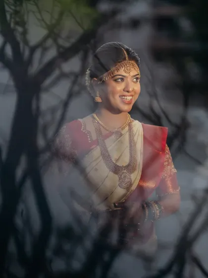 An artistic shot of the bride. The makeup is designed to look stunning even in creative or moody lighting.
