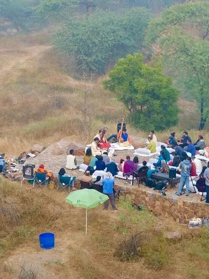 An aerial view of the audience settled in the Baithak, a beautiful manch created from natural materials, for the Raag Bhairav performance.