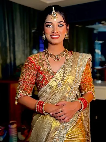 The final look of the golden Kanchivaram drape. The bride looks radiant and confident, ready for her big moment.