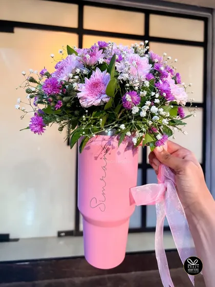 A gift that's both personal and pretty. We turned this personalized sipper into a beautiful flower bouquet for a unique and thoughtful birthday present.