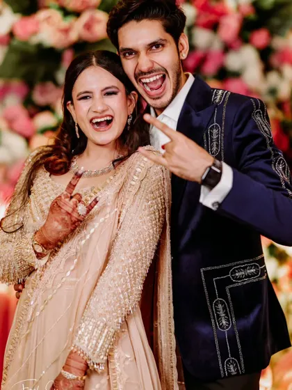 Pure, uninhibited fun at the reception. We love capturing these candid moments of laughter and energy that show the couple's true personalities.