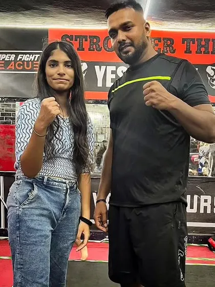 A picture with one of my dedicated female students. We build strong bonds in our team.