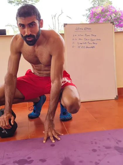 Being uncomfortable is part of the process. This is me after a 40-minute EMOM workout. You have to get used to the discomfort to see real growth.