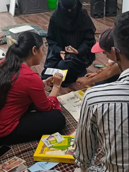A group of participants works together on a task using 'Samvidhan' game cards. We use gamified learning to make the exploration of constitutional values fun and interactive.