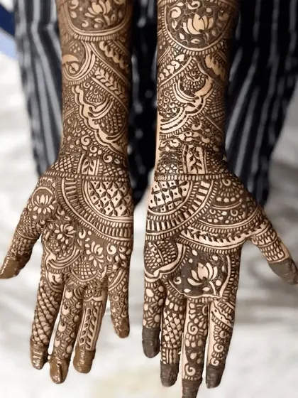 Look at the confidence in this student's work. The design features intricate patterns and perfectly balanced lotus motifs, all learned during the course.