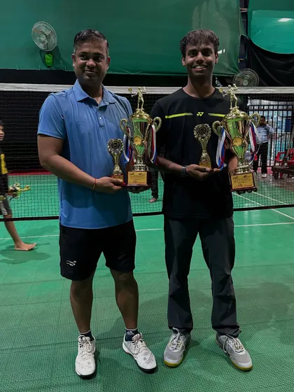 A closer look at the B Group Men's Doubles winners with their trophies.