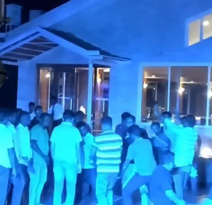 An outdoor corporate event for Godrej, with guests starting to gather on the dance floor.