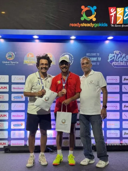 We lead by example. Here, our Co-Founder & Director, Jay Shah, celebrates a Bronze Medal win at a major pickleball tournament. This reflects our core philosophy that passion and active participation in sports are at the heart of our leadership and community.