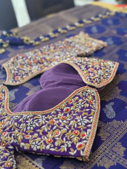 The full layout of the purple and red blouse.