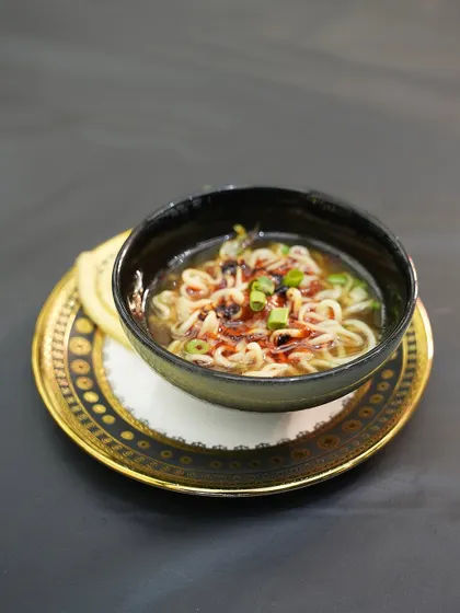 A bowl of pure comfort with a Korean kick. Our Veggie Ramyeon features a rich, flavourful broth, perfectly cooked noodles, and fresh toppings, served elegantly in a traditional bowl.