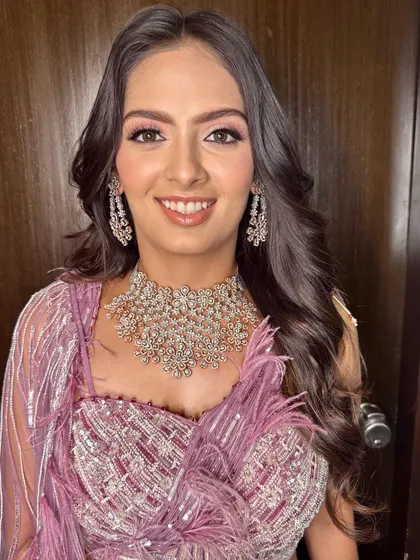 A close-up of the reception makeup, showing the shimmering eyeshadow and flawless complexion.