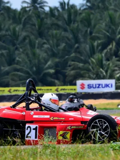 Our Formula LGB car against the scenic backdrop of the Kari Motor Speedway. We compete at India's premier racing circuits.