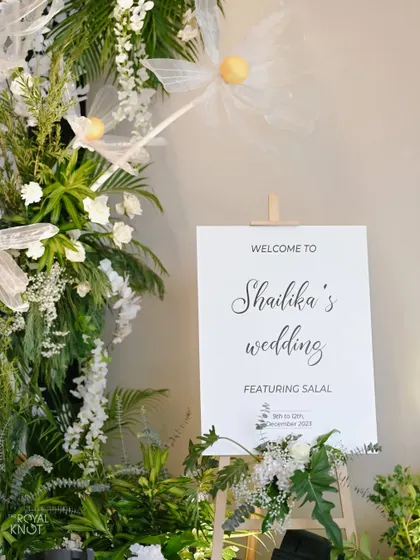 A welcome sign designed by us, featuring a fun and personal message from the bride.