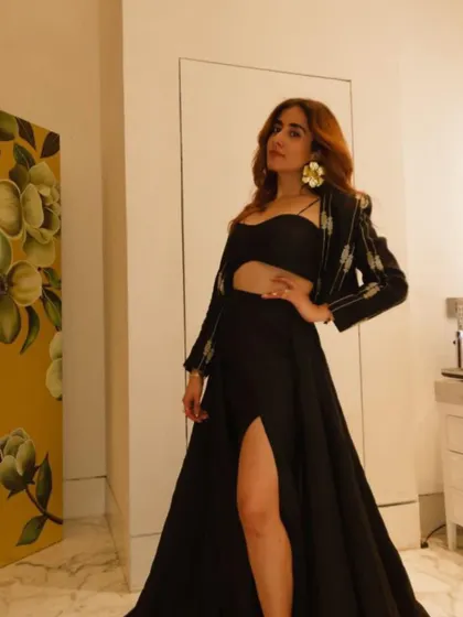 The incredible Jonita Gandhi owning the stage and the look in my Metallic Black Floral Statement Earrings. These are designed to be super lightweight so you can feel like a star all night long.
