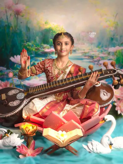 A beautiful portrait of a young girl as Goddess Saraswati, surrounded by swans and lotuses, with a sacred book open before her.