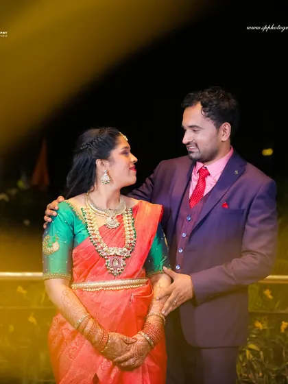 A romantic nighttime portrait of the couple. We use ambient lighting to create a warm, intimate atmosphere for our reception and engagement photos.