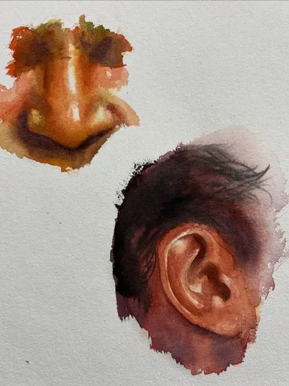 Watercolor studies of a nose and an ear, part of my portrait class focusing on individual facial features.