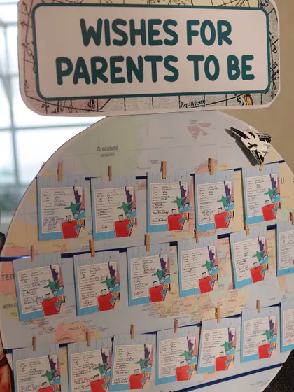 A wish board designed as a world map, where guests could pin their 'boarding pass' wishes.
