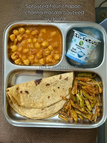 A classic North Indian combination, this meal includes sprouted flour chapati with channa masala (chickpea curry), sautéed ivy gourd, and Greek yogurt.