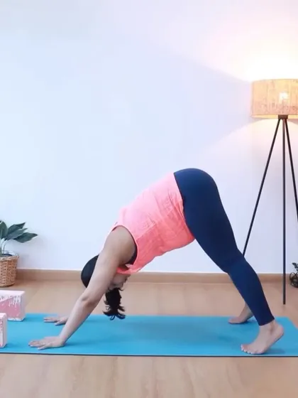 The downward-facing dog pose, when done with a wide stance, helps to lengthen the spine and open the pelvis, preparing your body for labor.