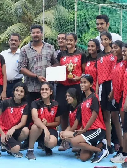 The St. Andrews girls' team with their winners' trophy. Their hard work in training paid off.