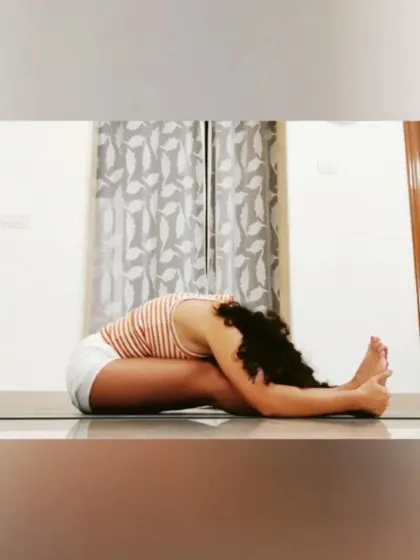 This is Paschimottanasana, the seated forward fold. It's a posture that greatly helps in relaxing the mind by activating the parasympathetic nervous system, but it takes work to get there.