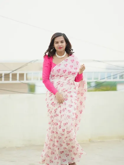 A full-length view of the mulmul cotton saree, showing its light and airy drape.