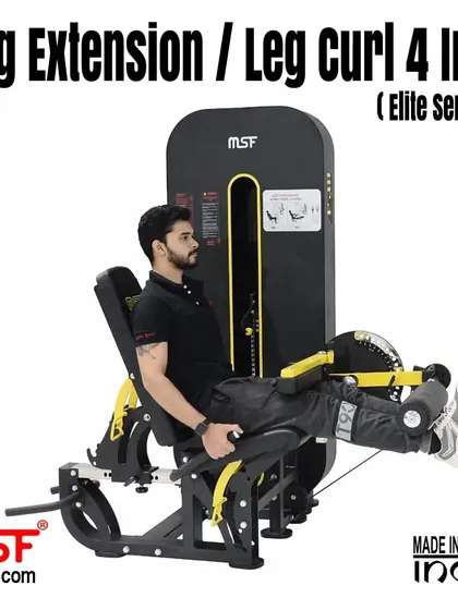 A user at the peak of the leg extension movement, isolating the quadriceps.