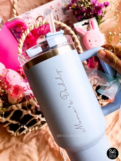 A duplicate of image 16, showing the personalized 'Mama's & Daddy' sipper in a beautiful hamper setting.