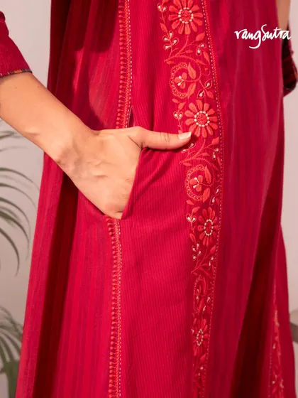 Our Haveli collection tells a story of heritage and craft. This detail shot shows the practical side pocket on our red Chikankari kurta, a feature we include in many of our designs.
