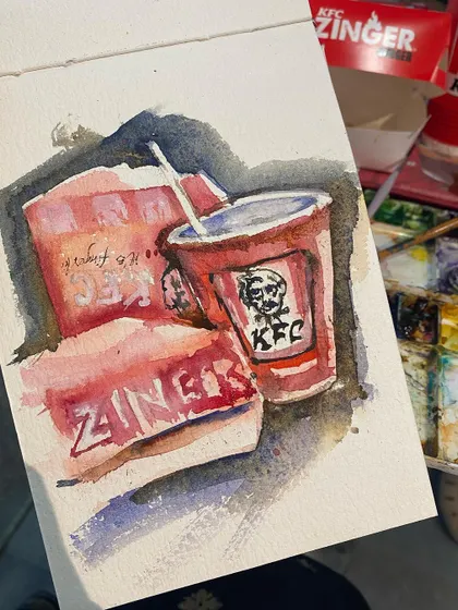 A quick sketch to go with a quick snack. This watercolor of a KFC meal was a fun, spontaneous painting done in my sketchbook.