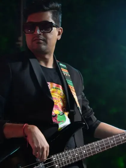 Our bassist, lost in the groove during a lively wedding set. Each member of the band brings their own passion and skill, contributing to our powerful collective sound.
