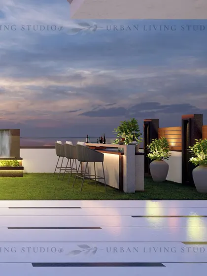 The bar and water feature area of the Ghaziabad terrace design. The combination of a waterfall and an outdoor bar adds both tranquility and a social element to the space.