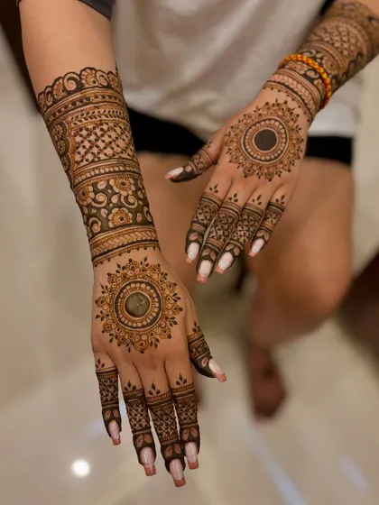 An angled view of Jasleen's Diwali mehendi.
