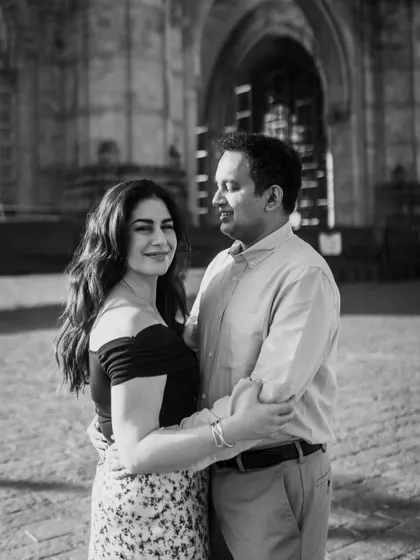 The same sweet moment captured in timeless black and white. This version emphasizes the emotion and connection between the couple.