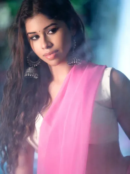 An atmospheric close-up with a soft, misty effect. This artistic approach creates a dreamy and romantic mood, perfect for beauty-focused ethnic portraits.